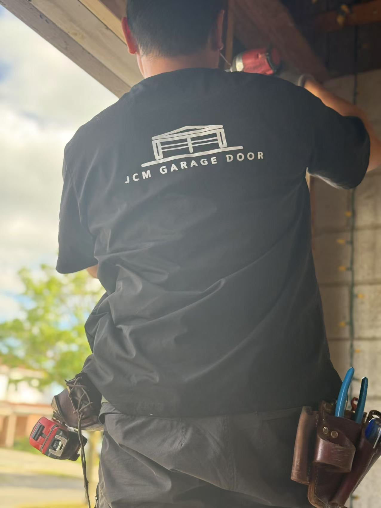 JCM Garage Door technician at work